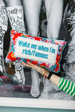 RIch and Famous Needlepoint pillow